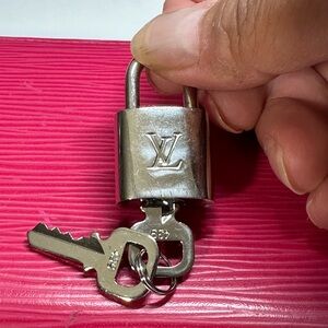 Louis Vuitton silver lock and key #439